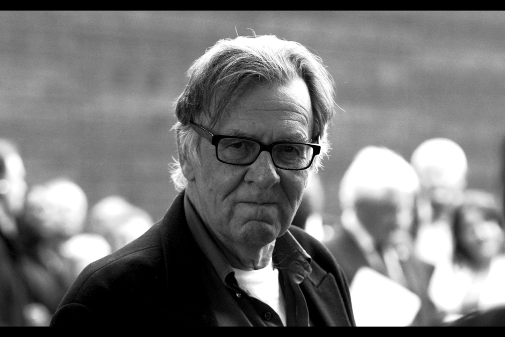 It's a TOM WILKINSON STAREDOWN!! (I got so excited I blinked immediately)