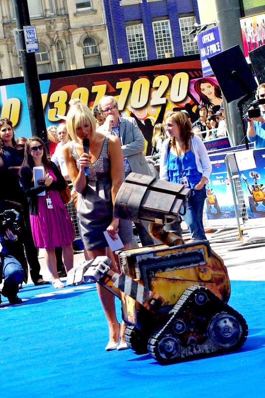 Some reporter is interviewing Wall-E. I don't know her name, and couldn't hear the question (or answer) but I like to think he was defending rumours he'd had an on-set affair with an electric kettle or something.