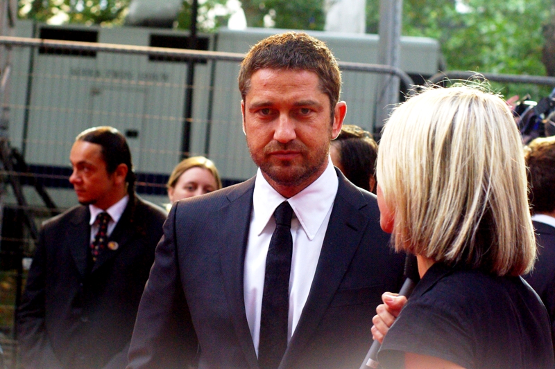 Gerard Butler. Who owes me $5 but is trying hard to pretend like he doesn't remember.