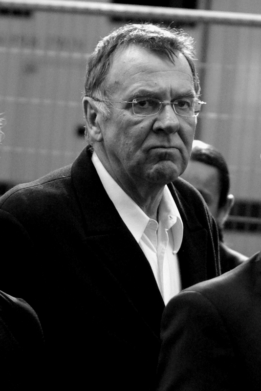 Tom Wilkinson. Aka Gotham City Crime Boss Falconio in 'Batman Begins'. He also owes me $5, but just for once I'm willing to waive it. As a favour.