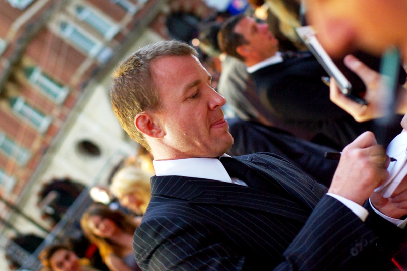 Guy Ritchie signing autographs (I like to think his name is pronounced 'Gi' in France)