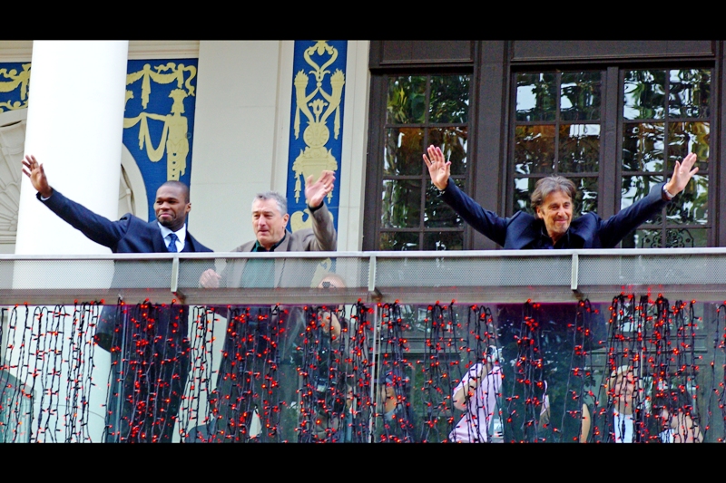 "HUZZAH!! We're famous and get a balcony while you people get crushed behind barriers voluntarily on a weekend to see us wave at you!!" Well... when you put it like that it's a whole lot less glamorous..