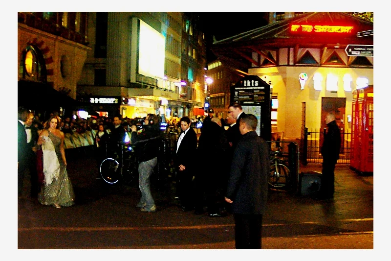(Far left, with white shawl) - Barbara Broccoli has been the producer of the last five or six (or seven?) Bond films, and her late father was producer of most of the rest.