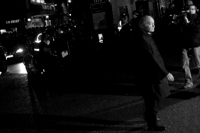 Wireimage tells me this is Mohammed Al Fayed, and Wikipedia tells me he's got a personal worth of approximately 550 million British pounds. Looks lonely, doesn't he?