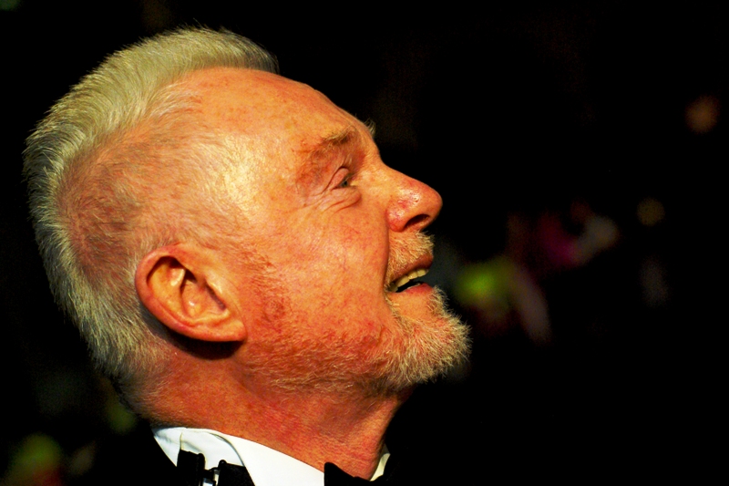 This is Derek Jacobi, indicating "If you're going to profess not to know what I've done in my illustrious career as a thespian of some reknown, could you at least remember I've got a knighthood?".