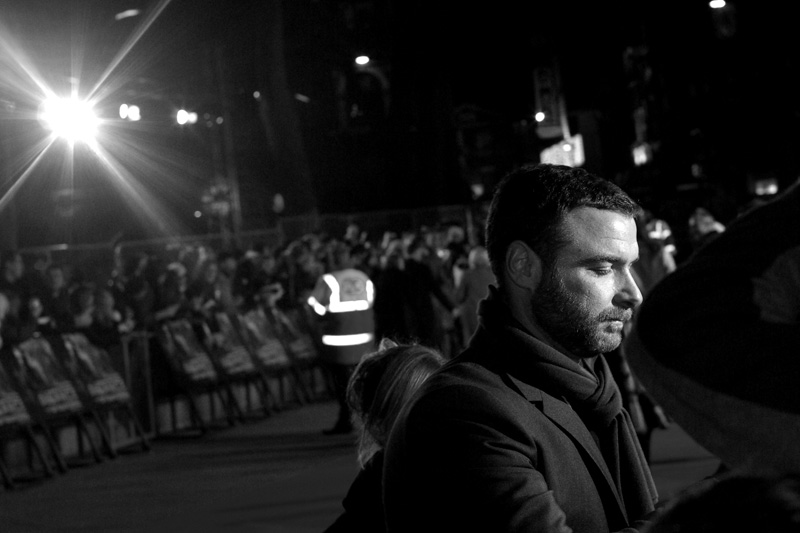 It's Liev Schreiber. (His name rings a bell but I really can't place him. The girls around me who didn't get an autograph from Daniel Craig seemed happy to get his, though.) It's the only photo from the night that I can say I'm pretty much happy with.