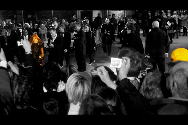 Yellow Cap Guy and Isla Fisher. Star-Crossed Lovers, or Star and Cap Lover? (See what I did there?) Only they know for sure, I guess.