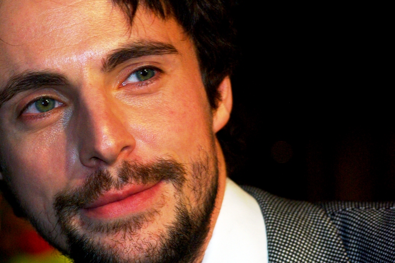 Owing to an oversight, I only brought one lens with me this evening, the mighty 90mm f2.8. It's not a zoom, which means I either move back (which I can't) or my lens gets real close. This is Matthew Goode. Very close to the fans.