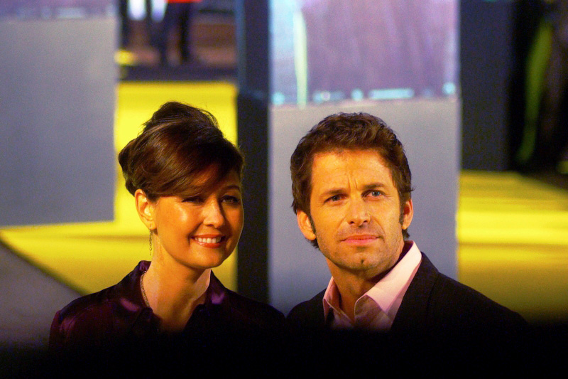 Zack Snyder (director) and wife Deborah Snyder (producer) say "Hi... no, we won't stay to watch the movie this evening. But we hear it's good!"