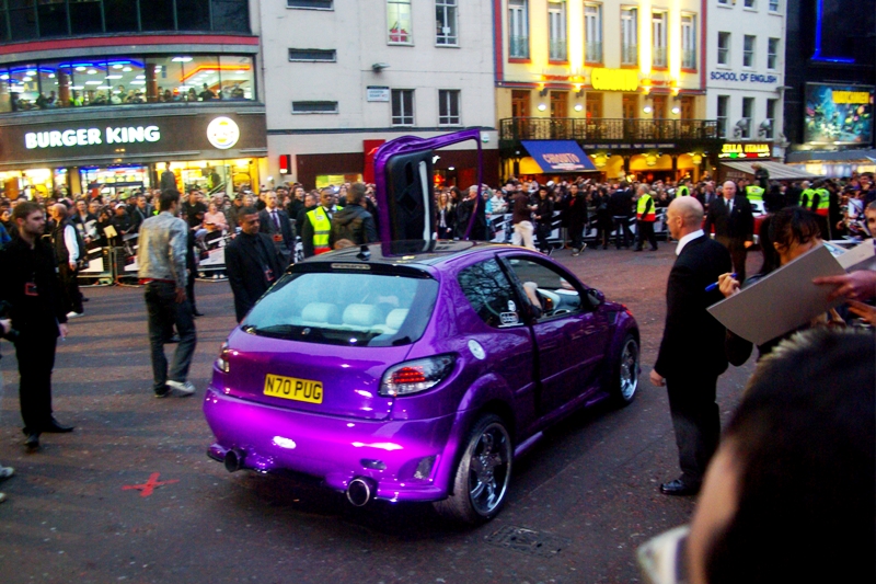 Gull-wing doors are always cool. Purple colour schemes.... less often so. (That's my opinion as a Red Nissan Pulsar driver. Automatic. Sedan. ... hey, I'm credible!)