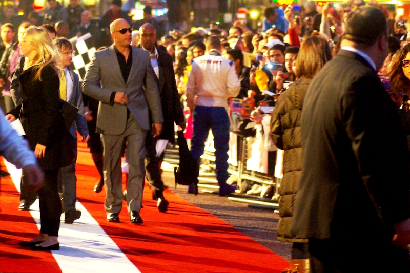 Timestamp 6:24pm. It's been a long day. Vin Diesel makes his way back to his car. (But Vin! Vin! We waited in the blistering cold for you! We kept watching Tokyo Drift to see your cameo! We saw you in that other movie where you had hair! We Watched Chronicles of Freaking Riddick for you, Vin! Why, Vin, Why?)
