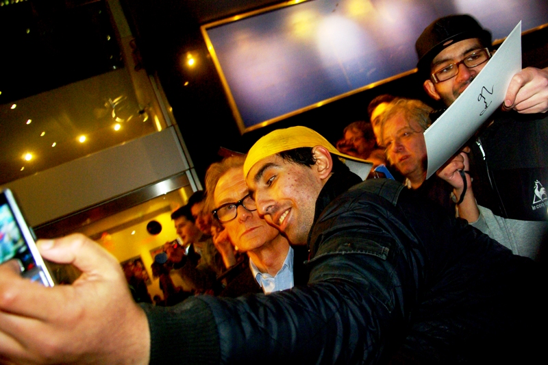 Meanwhile, to my right, actor Bill Nighy reacts with appropriate confusion and reverence at being so close to the legendary Yellow Cap Guy.