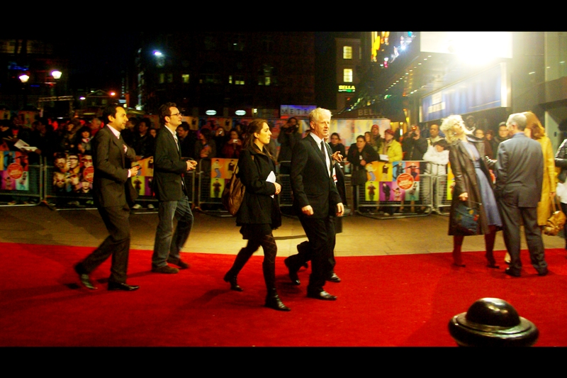 This photo of director Richard Curtis (who also wrote and directed 'Love Actually' as well as having numerous writing credits) is fairly cool in its own right, but the lady having a pseudo-religious experience on the red carpet to his right kind of wins it for me. (she didn't actually fall, she just kind of... leaned...)