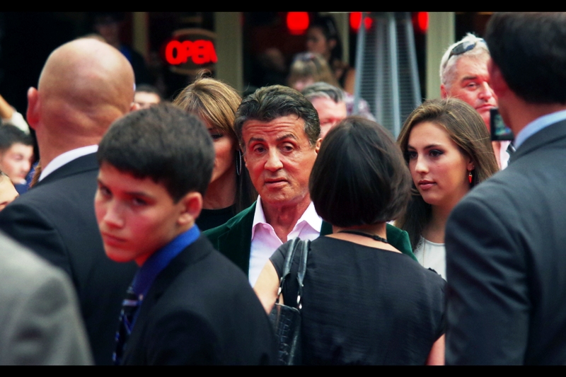 Fittingly, our first arrival is The Main Guy - Sylvester Stallone himself. He wrote and directed Rocky and starred in it, he's been Rambo, he conceived of The Expendables.... he was even in Stop! Or My Mom Will Shoot. In all respects he's earned the right to wear a green-jacked suit to an Expendables III premiere. I'll be showcasing more of it in this journal... it's quite spectacular(ish)