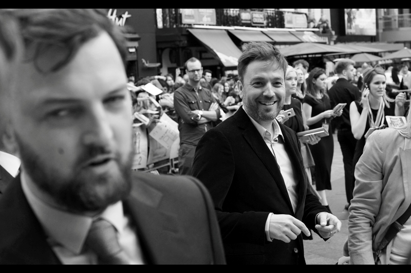 "You're absolutely right. I AM one of the two directors of this film, and the more handsome and talented on as well. Wait... the other guy isn't behind me, is he?" Damon Beesley (foreground) correctly anticipates the arrival of Iain Morris).