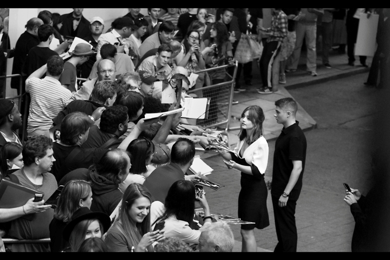 Jenna Coleman keeps signing, and her bodyguard keeps guarding her..... body.
