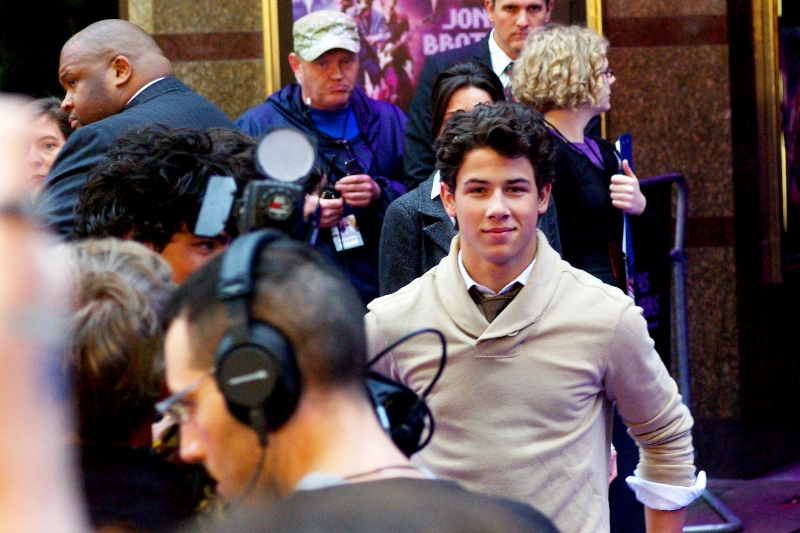 Wow... more eye-contact! Me and those Jonas Brother are really jiving. Sadly, I am neither aged between 8 and 15 nor female. I'm just here in case Taylor Swift shows up. As I said. Because I may be creepy, but I have taste. I'll take my bland-inoffensive country-songstress over your bland-inoffensive-boy-band-pop-rock any day. If Def Leppard and Whitesnake are off the table, I mean.