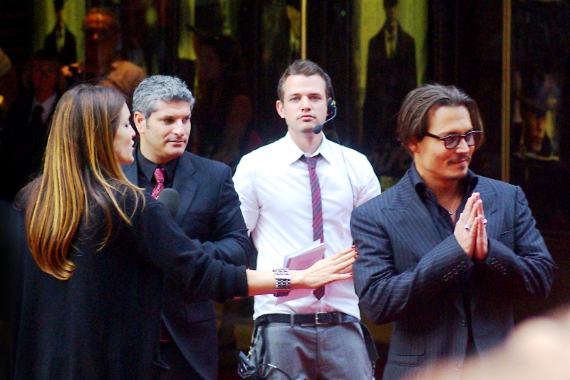 "I'm sorry guys, but I can't sign for you. But you'll always remember this as the day you ALMOST got captain Jack Sparrow's autograph" Tough break, but to his credit Depp took his entourage to the furthest reaches of this premiere. He seems less twitchy in real life, too. (I'm both relieved and mildly disappointed by this)