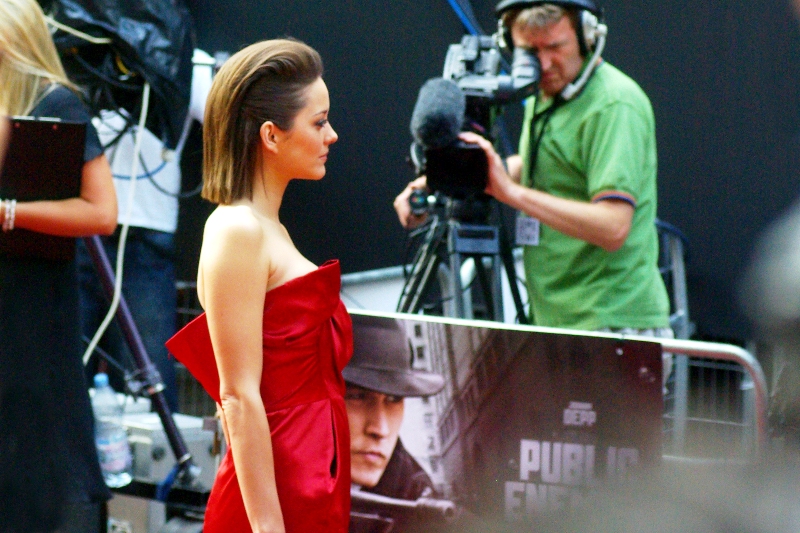 Excellently, I've found an equally impressive non-Johnny Depp attendee to photograph (your view may vary on this). And firstly - Marion Cotillard's dress? Seemed unstable. Or still under construction. Certainly Intriguing.