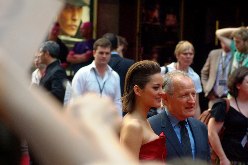 So, once again... Marion Cotillard and Michael Mann, the only guy whose mother can complain she was in labour for two days to bring him into the world, and he'll respond by saying he can edit that into a movie that takes four days to watch.