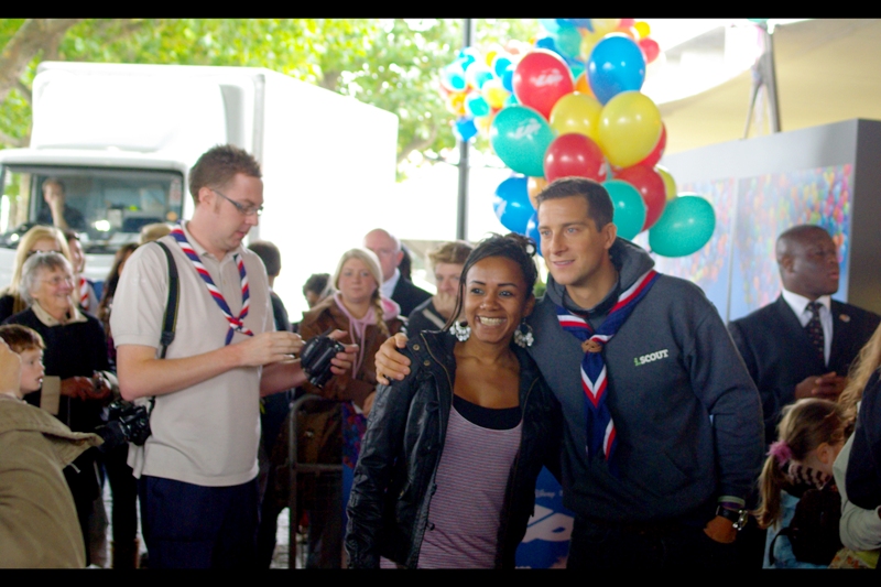 The guy with the scout necktie is called (I kid you not) 'Bear Grylls' and he's some kind of presenter / adventurer. His connection to the film is apparently that they invited him as there's a South Korean Scout character in the movie, and he is England's Chief Scout. (Bear? Grylls??). (Me, 2014. Bear Grylls is awesome, Past Me) (Past Me : stop polluting the timeline with spoilers, dude). Oh, and note the truck in the background... you don't see those at many premieres.