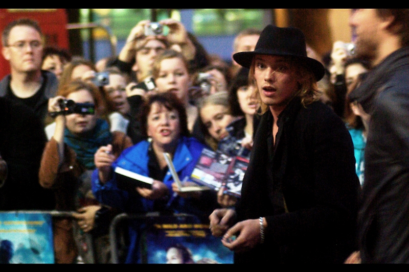 Rather amazingly, I've managed to track down this guy's identity. Some fans near me were desperately beckoning him over and a had a promo picture I recognised as being from 'Twilight - New Moon'. So I've tracked down that photo and he is apparently actor Jamie Campbell Bower. If I'm right, what do I win??