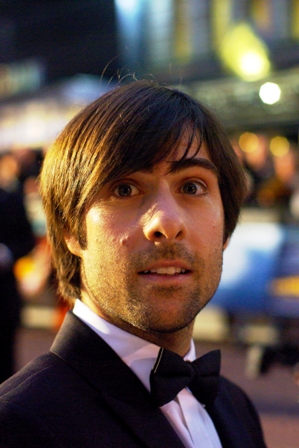 This is Jason Schwartzman. I had to check IMDB to find out why he looked familiar but not quite like the guy from the American Pie films, which he's not in. But the hairstyle and bow tie are clearly top-notch. (ps. he's excellent in the later-released Scott Pilgrim vs the World)
