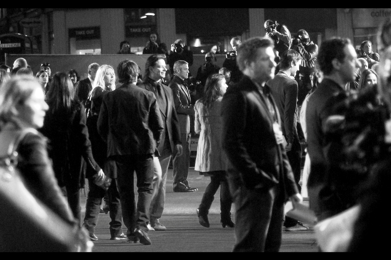 Why not try to see if you can find Kevin Spacey, Jeff Bridges, and Ewan MacGregor in this picture. (You can't? Yes, that's because only George Clooney is at this premiere). What's more, he's actually blending in, in a way that you wouldn't think possible. Why... people of his calibre and fame could be walking, unnoticed, among us! All the time, even!