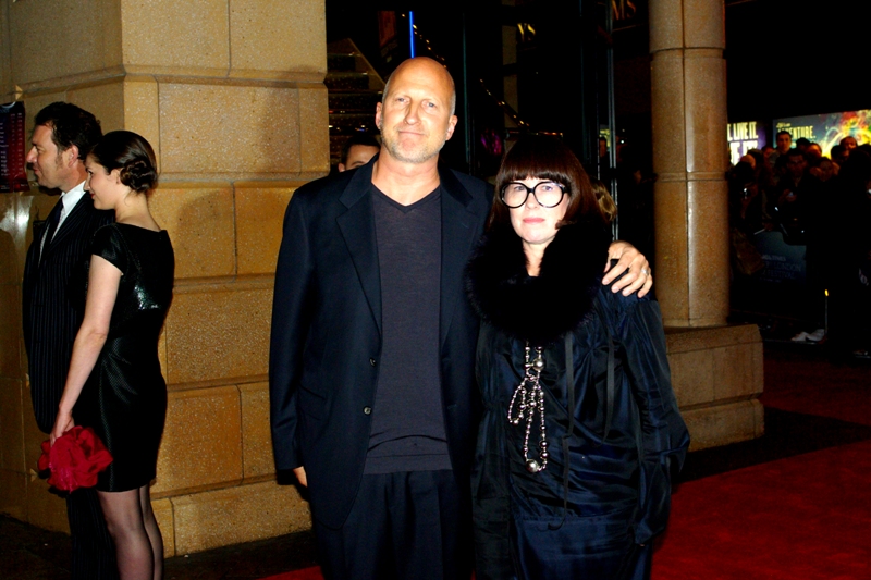 So while I try not to get distracted by the pretty girl to my left, the event for 'The Road' has started. And this is John Hillcoat, the Australian director of the film. The lady with him is not identified by wireimage, but with all due respect (because I really like the character), I'd say she's gunning for the spitting image of "Edna Mode from The Incredibles"