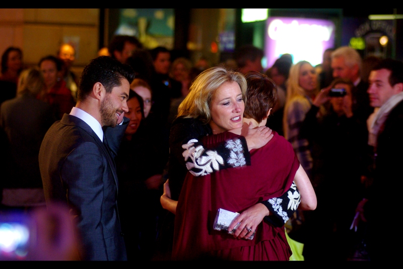 "There, there... rottentomatoes.com might only give it an aggregated *90%* positive critics review, but that doesn't mean the movie is *all* bad" Actress Carey Mulligan gets consoled (?) on the red carpet.