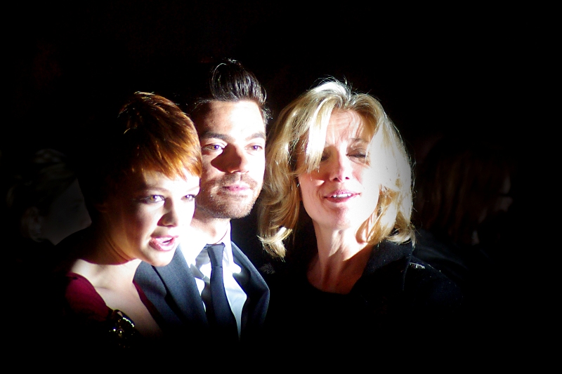 The dynamic trio posed in front of the wall o'paps for a fair while. And despite a staggering failure rate of shots taken while competing with Paparazzi flashes going off, I had several shots that turned out okay. This one, however, was the most interesting!
