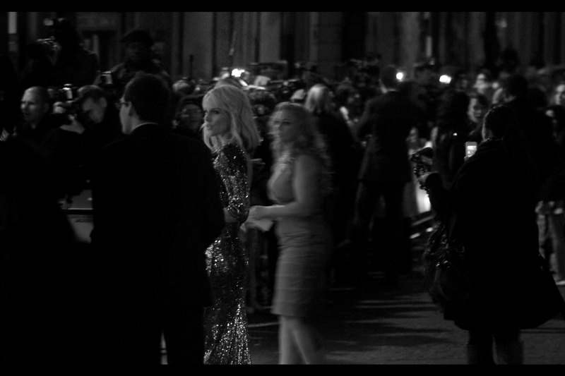 If I could have better-exposed just ONE photo I took at this premiere, it would be this one. Monet Mazur is looking very 'leading lady-esque' being led to the double wall o'paps.