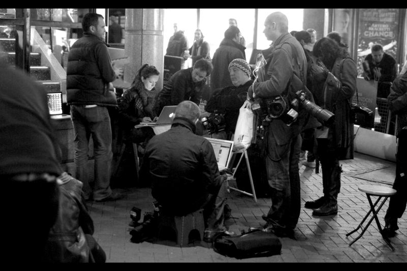 The photographers from the Dead Man Running premiere basically packed up their gear and crossed Leicester Square en masse and found places to sit down and upload their pictures while their 'press pen' was constructed