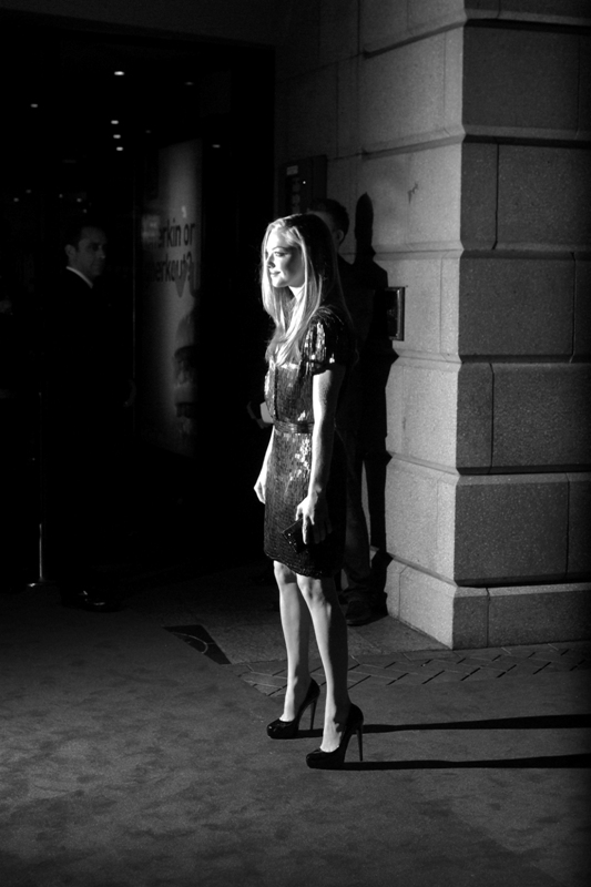 Ah, nighttime film premiere photography. Either you turn up the grain and suffer the quality, or set a fast shutter speed and pray for paparazzi flash-assists to help you out. (I did okay on this one)