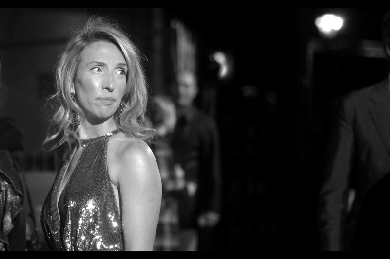 This is Director Sam Taylor-Wood. Per wikipedia, "In 2002, Taylor-Wood was commissioned by the National Portrait Gallery to make a video portrait of David Beckham sleeping." I... have nothing further to add. Nice dress, though.