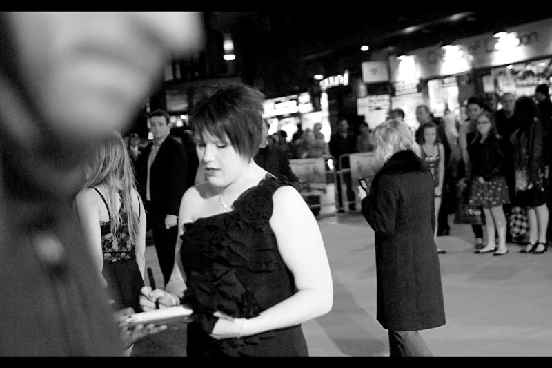 Actually, by a process of elimination (also known as "using the number of girls in the cast listing and their names" ), I have concluded that this is probably Amy Scott. Or Germaine Greer. (Or, maybe Sir Richard if he's doing it for publicity).