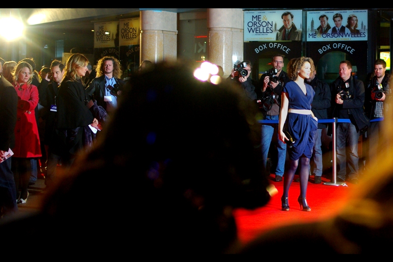 I'm not sure who the lady in blue dress is, I'm just intrigued at the body language of the girl in red further behind her. I'd love to think there's some kind of feud going on.