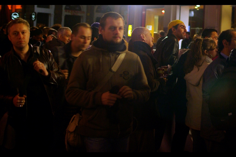 It's a movie premiere, Yellow Cap Guy *has* been safely sighted, and all is well with the world again.