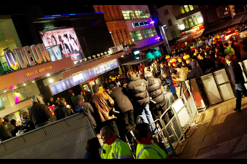 This is what the premiere looked like from a different angle: cinema on the far left, Paparazzi on the front left, security blocking off the public. (This shot was taken about as high and blind as I’m capable of, short of some rather risky and pointless bone extension surgery)