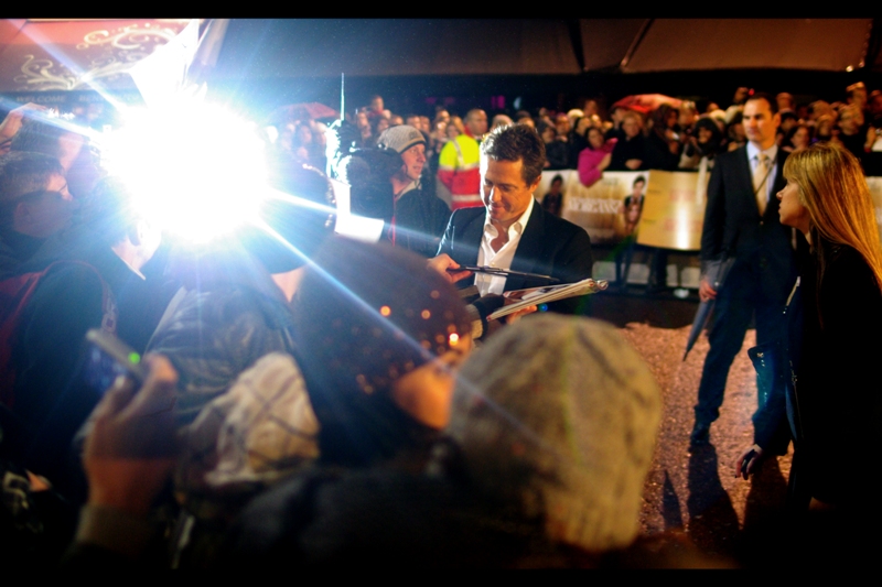 Hugh Grant. Lens Flares. It's all happening, if by "all" you're okay with it just being a dude and a lens flare. Also : HUGH GRANT!