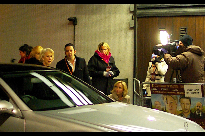 Dame Helen Mirren arrives. She can’t see Yellow Cap Guy, she can’t immediately see the red carpet, and accordingly is not sure she’s even at the right place. I can sympathise!