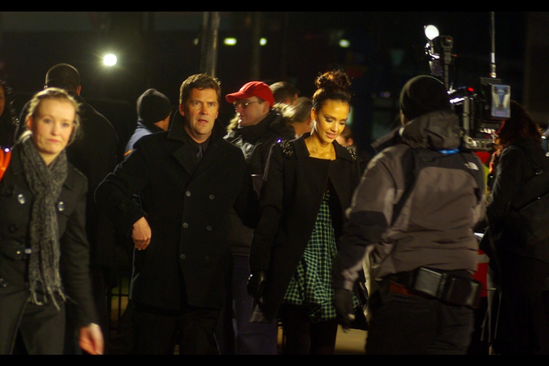 Jessica Alba has clearly reached some kind of zen state, while her accompanying guy/dude/security/valet makes yet another amusing face.