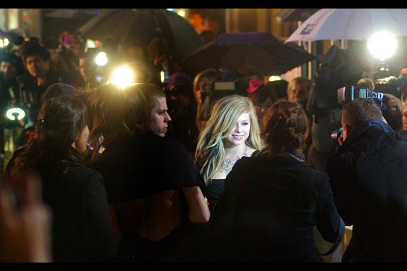 For no readily apparent reason, former teen singing-sensation and now twentysomething singer Avril Levigne showed up, standing exactly where you might have wanted Johnny Depp to stand earlier. (Come baaaack!).
