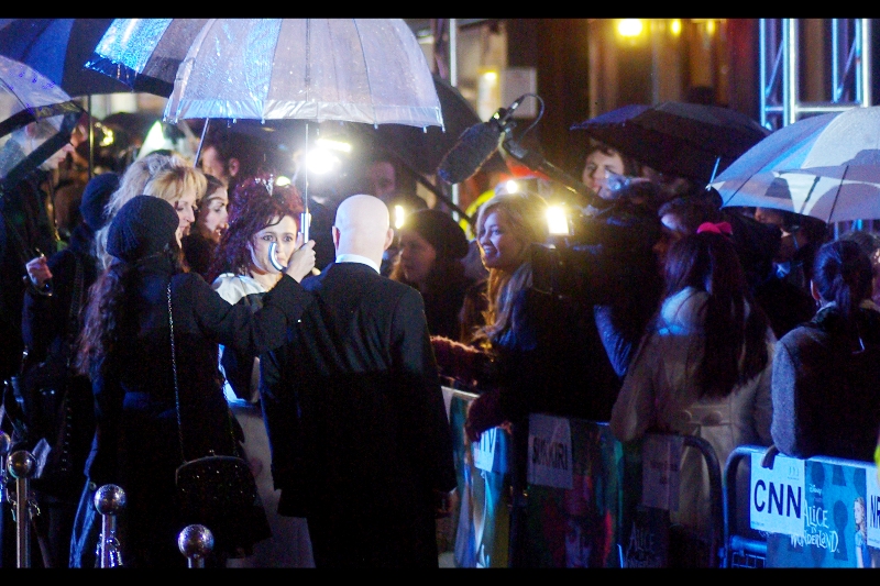 ... and now he's conspiring to block off even more people? See... now this is just unlucky! (Helena Bonham-Carter and an umbrella handle...)
