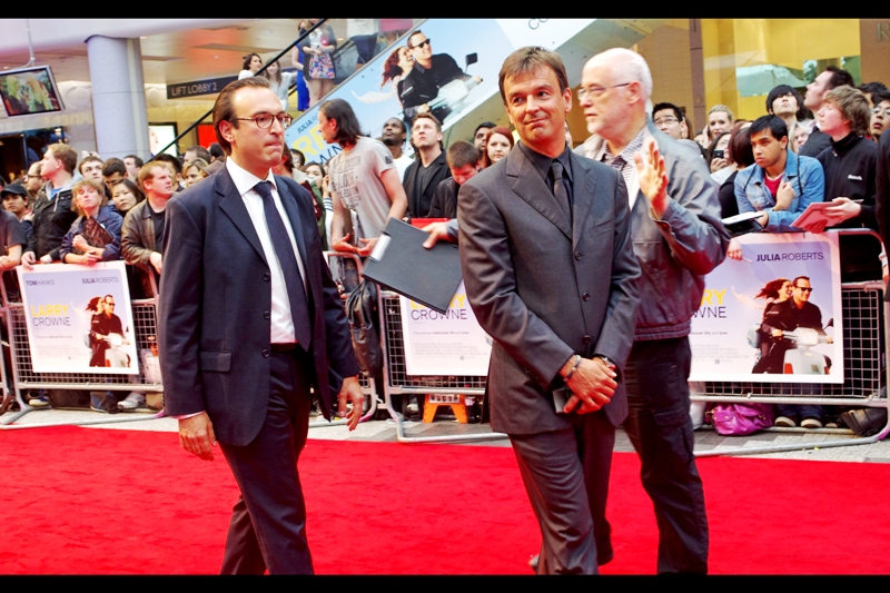 Two of the film's producers are happy to be led to the Paparazzi scrum. I didn't catch their names, but I think one had a French accent.