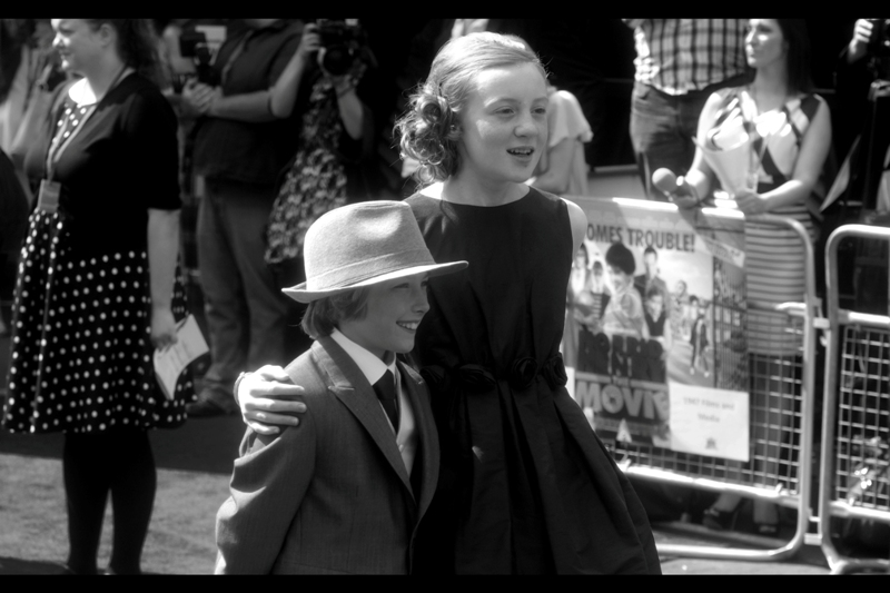 I assume this is Princess Leia and the kid who plays R2-D2 in the Star Wars reboot / prequel. I'm sorry - I wasn't paying attention (edited to add : she's Scarlett Stitt, and he is (or might be) Ross Marron)