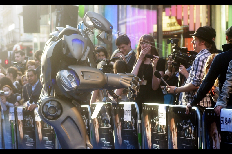 Robot : "I know now why you cry" Reporter : "Is that water?" Robot :"No, it's lighter fluid. Can I borrow a match?". (In truth, this was a rather remarkable machine - walking up and down the blue carpet spouting movie quotes and theme songs - very entertaining. Also possibly not murderous )