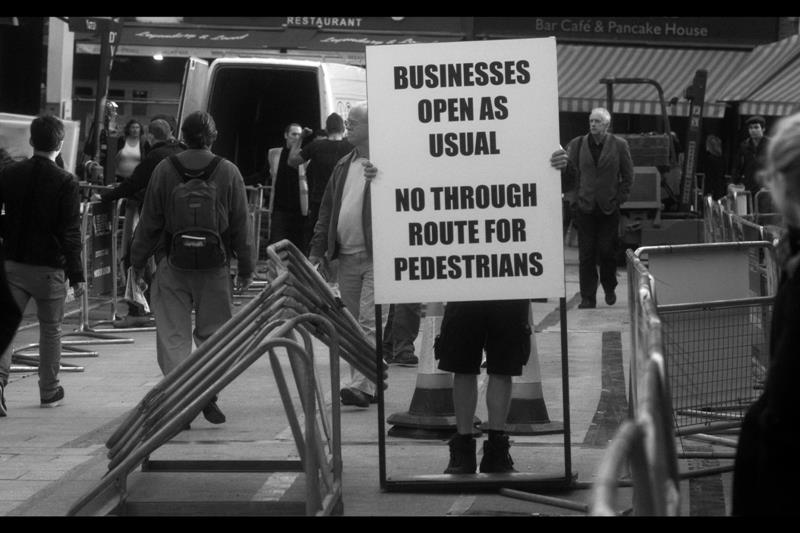 At first I thought maybe the Anticapitalists at Occupy LSX across town had branched off and/or had moved on to really cryptic and subtly subversive placards, but no. It's just your standard high commerce stuff.