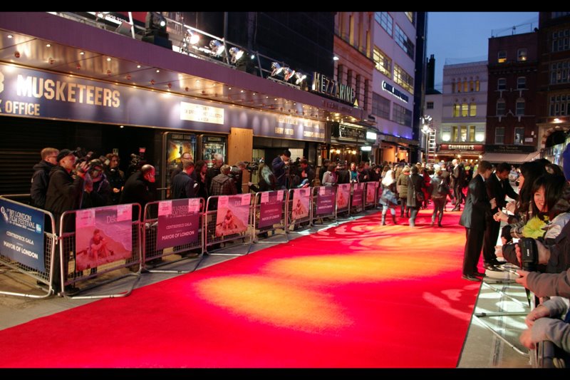 Finally, Red Carpet laid, weird spirally hypnosis spotlights activated, and ... yeah, still with the damn Hawaiian power-jazz. It's bad enough that it's cold enough to totally jar against reality... it's also really, really BAD.