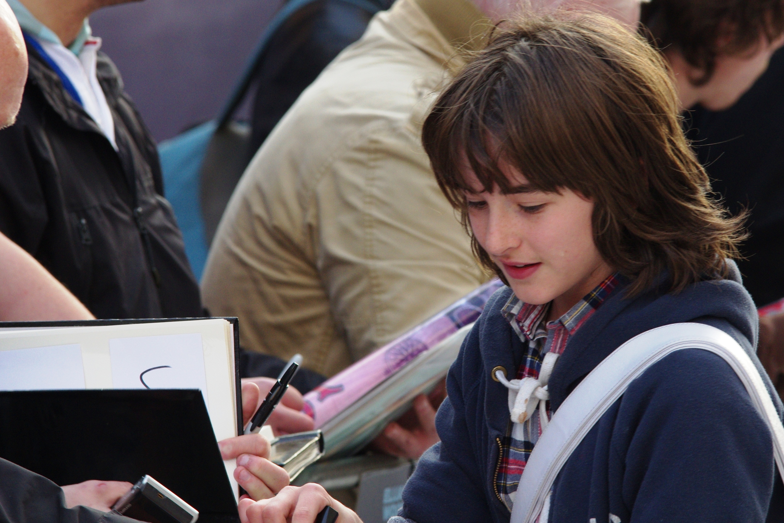 Good luck to anyone who is a handwriting analyst. That autograph just screams "alien glyphs language".I have no clue as to the name and/or fame of (or even gender to a 100% degree of accuracy) of this person. (Me, 2014 : looks amazingly like Isaac Hempstead Wright, who went on to play Brann in Game of Thrones... but he's not in this movie... so I'm not sure....)